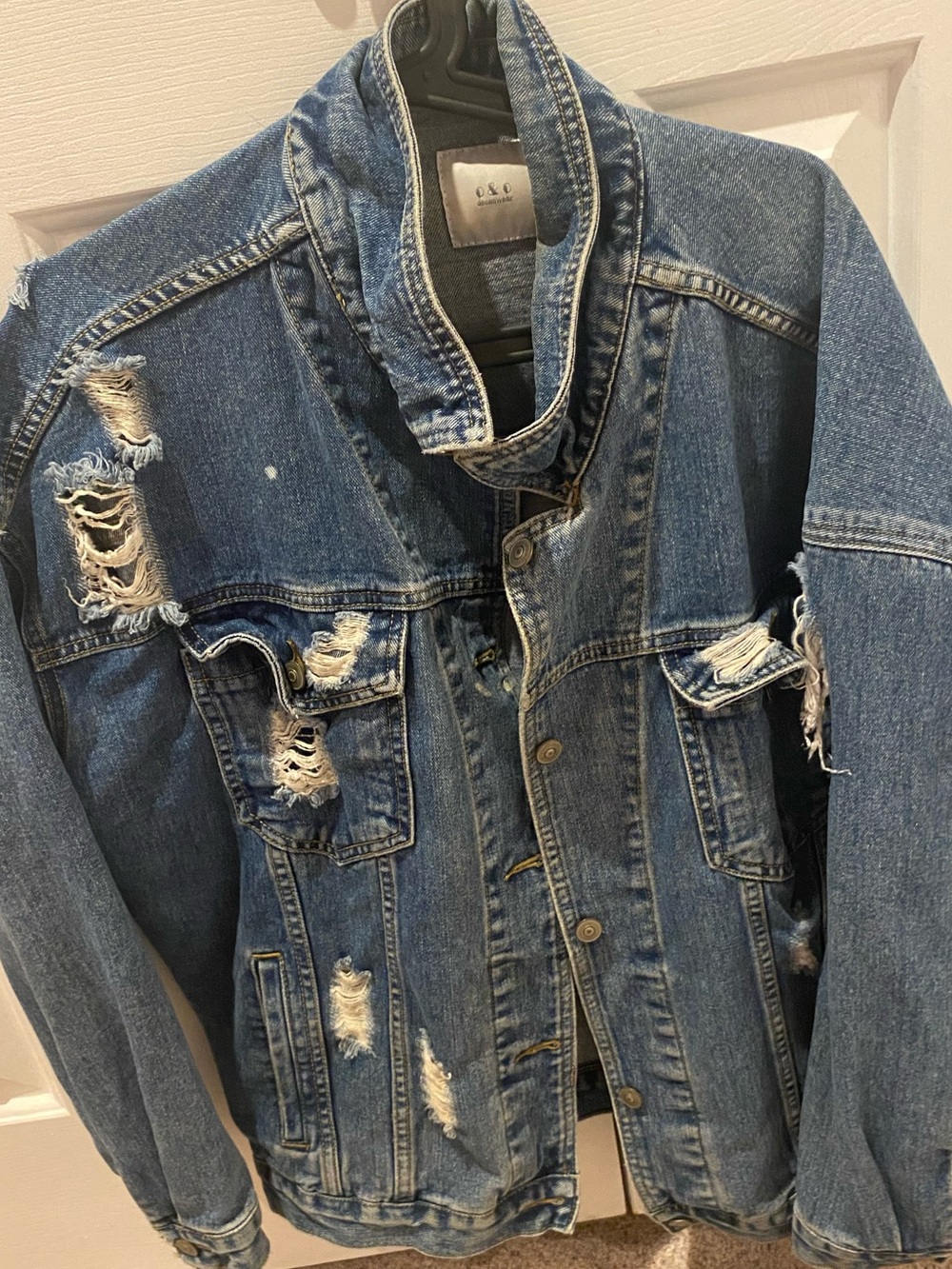 Distressed denim jacket in size large. Really cute it came from our boutique.